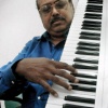 K J Joy-Music Director